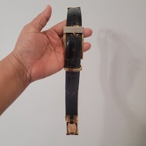 Elegant Black Leather Belt with Gold and Silver Buckle